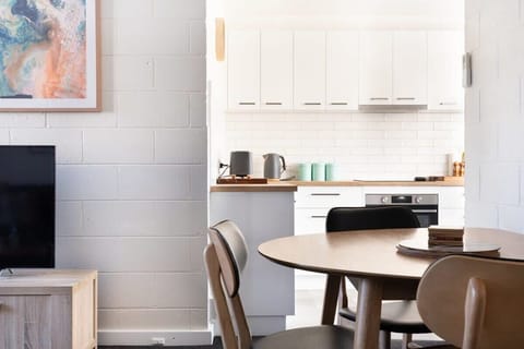 Seamless flow from the living-dining into the renovated kitchen