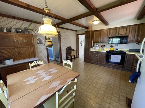 HUGE Chefs Kitchen with electric oven, microwave.  Just bring food.
