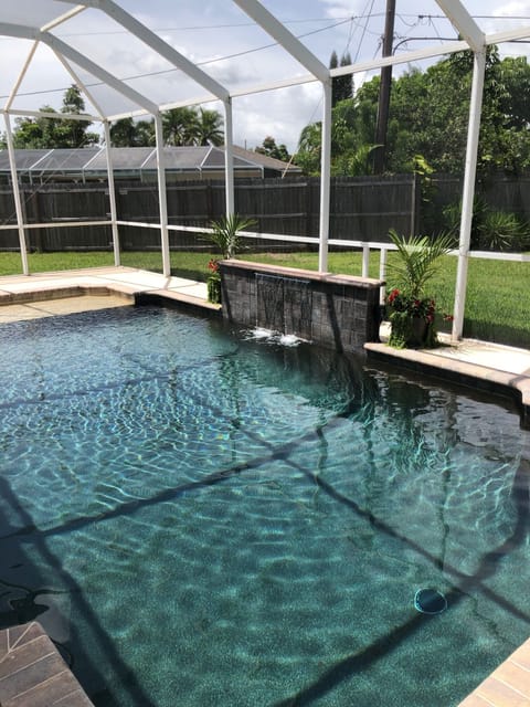 Large pool with sun deck ledge