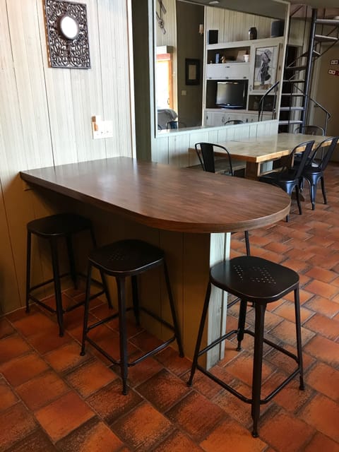 Seating for up to 12 in kitchen and dining areas.