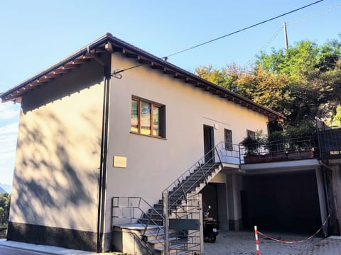 Sky, Building, Property, Window, Plant, House, Architecture, Shade, Wood, Slope