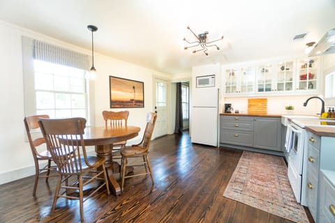 Updated kitchen w/fridge, microwave, stove and more.