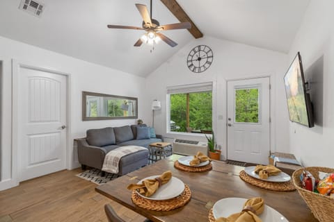 Living/dining with wooded views