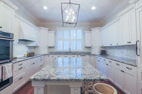 There's plenty of room in the kitchen for you and your guests to prepare your meals.