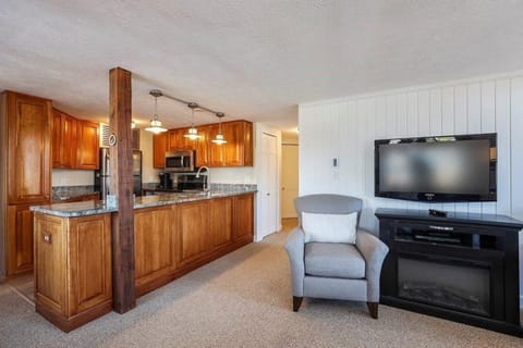 Kitchen and Hallway to Twin Bedroom and adjacent bathroom and front door