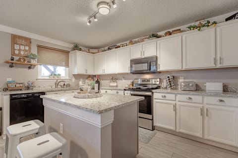 Spacious luxury kitchen with island and granite countertops 