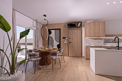 The open plan kitchen-dining area.