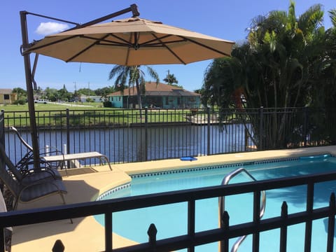 Heated pool w umbrella & comfortable seating to watch  boats and wildlife.