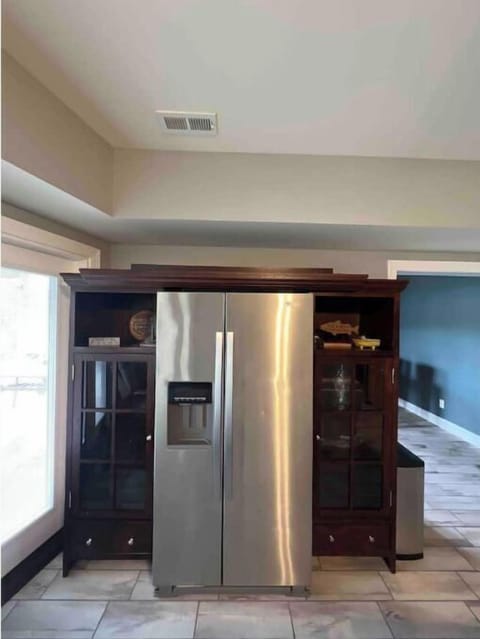 Full size refrigerator. Does not have ice maker or water dispenser 😔