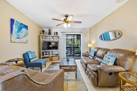 The living room area with access to the balcony.
