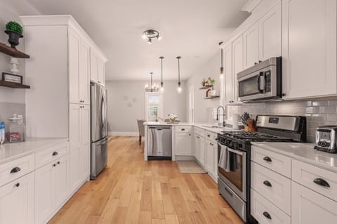 Newly Gourmet Kitchen with upgraded appliances & everything you need for meals