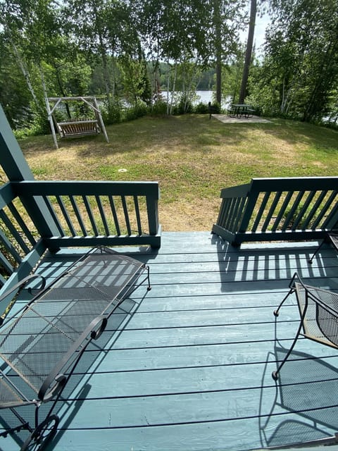 Summer patio on Wynne Point, picnic table, bbq station.