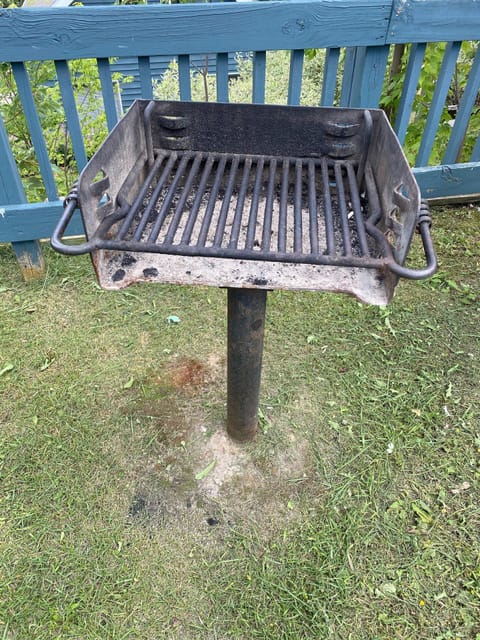 Charcoal grill station outside your door, just bring charcoal!