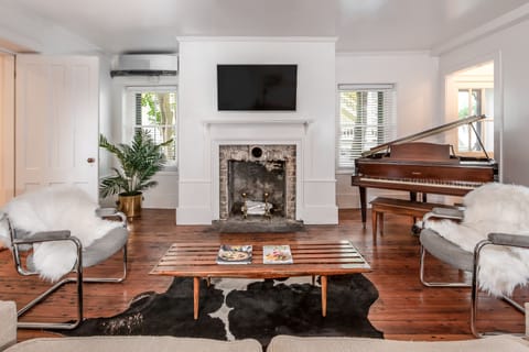Spacious living area with piano