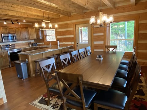 Dining room and kitchen. Seating for 16.  