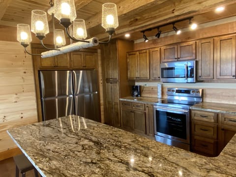Beautiful custom kitchen. Granite, dual refrigerators. 
