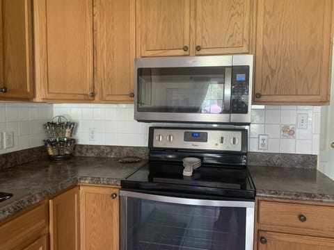 Fully furnished kitchen with all stainless steel appliances. 