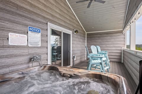View from the hot tub across the deck and settee chairs. Peaceful and relaxing.