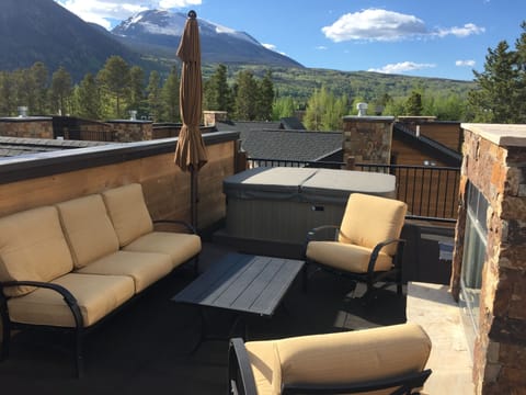 Rooftop deck with hot tub and gas fireplace