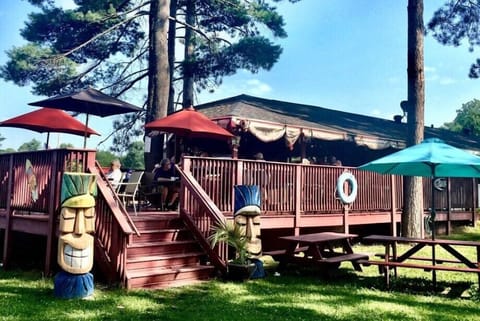 Stop by for the fun island feel and sip a tropical cocktail at the Pub N Prime Tiki Bar in St. Germain.