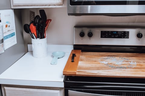 Kitchen stove with noodle board logo, great to
Protect stove and serving tray