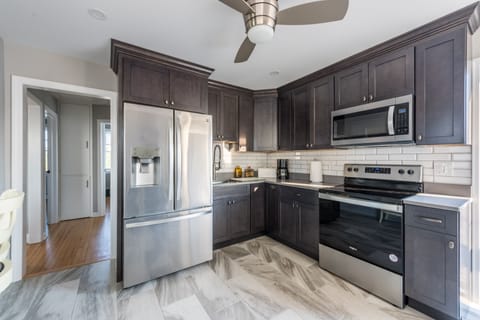 Brand new gourmet Kitchen with Quartz countertops
