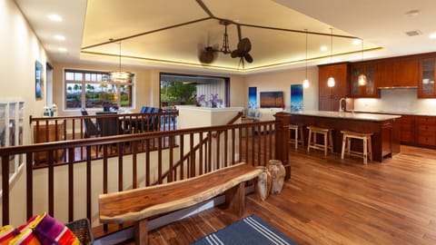 Vaulted grass cloth ceilings over the main floor great room