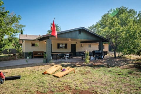 This may not be 40 acres in Sedona, but three continuous lots is actually one of the biggest single parcels in grasshopper flats, the oldest and best located neighborhood in West Sedona. Enjoy a large yard on either side of the main house. 