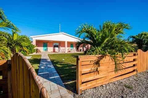 Private Back Yard - The backyard is fenced with 2 showers and 2 entries into the house.