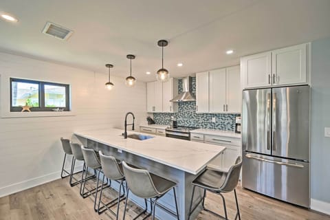 Chat with the chef at the marble counter breakfast bar.