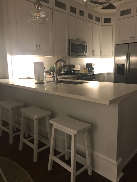 Kitchen with island dining.