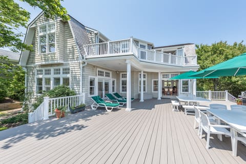 Back deck with grill.  Overlooking nature preserve and ocean.