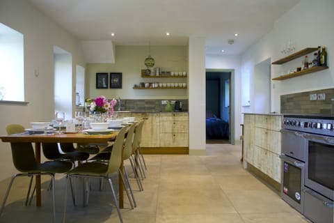 Kitchen and dining area, can seat 8 guests comfortably.