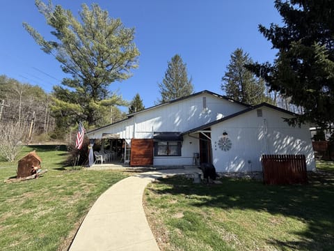 Charming cabin retreat with spacious yard and mountain views