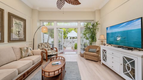 CARIBBEAN CHARM is a classic island townhome is located within Truman Annex, Key West's most exclusive gated community...