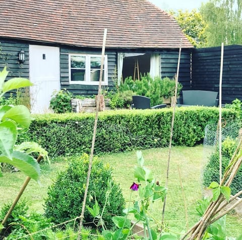 The garden terrace in front of the stables