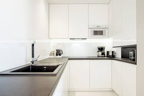 Modern, fully equipped kitchenette.