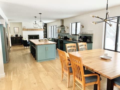 Open, and bright dining, kitchen, and lounge…