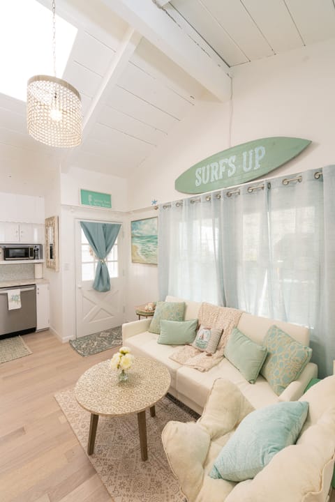Cozy and bright with vaulted ceiling.