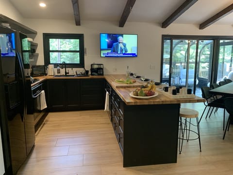 Kitchen is equipped w two electric ovens and one coocktop
