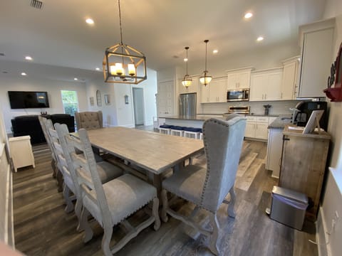 Kitchen/dining area opens into living room offering ample space for entertaining