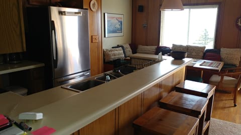 Kitchen, with dining area beyond