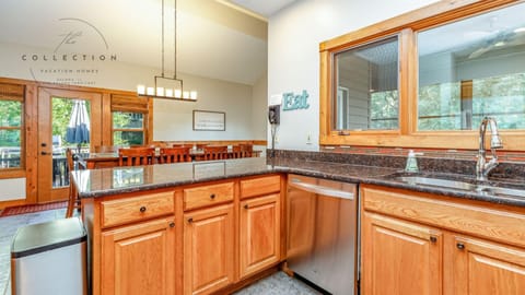 Fully stocked kitchen with large dining room adjacent
