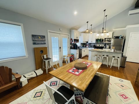 Dinning area with seating for 6 and 3 at the counter in the eat in kitchen. 2022