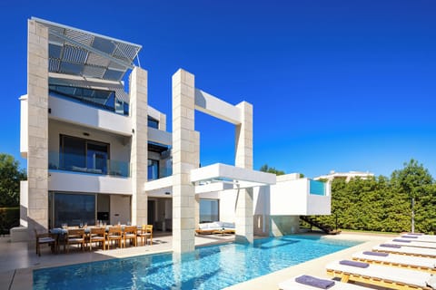 Two private heated swimming pools and spacious outdoor area.