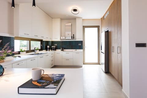 Fully equipped kitchen on the ground floor.