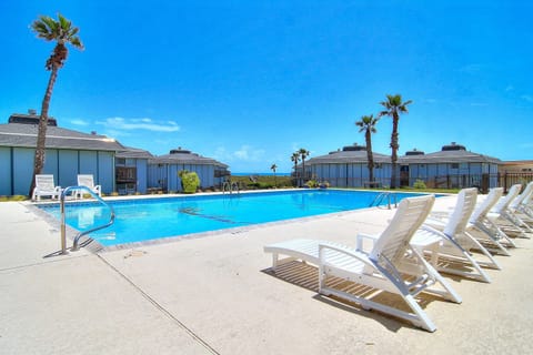 A crystal-clear pool surrounded by comfortable loungers awaits your perfect day of relaxation under the California sun.