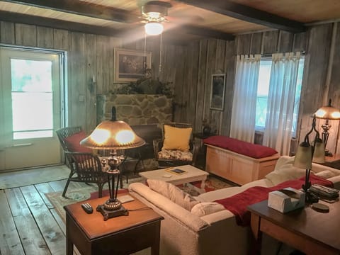Studio apartment.  Walls are reclaimed barn wood and floors are pine