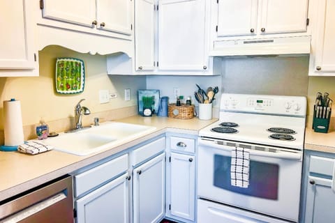 There's plenty of room in the kitchen for you and your guests to prepare your meals.