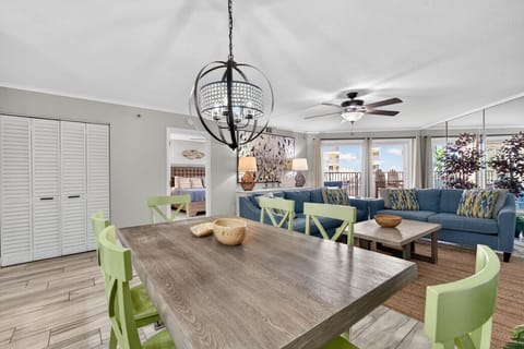 Casual dining space w/ ceiling fan and easy flow to the living area